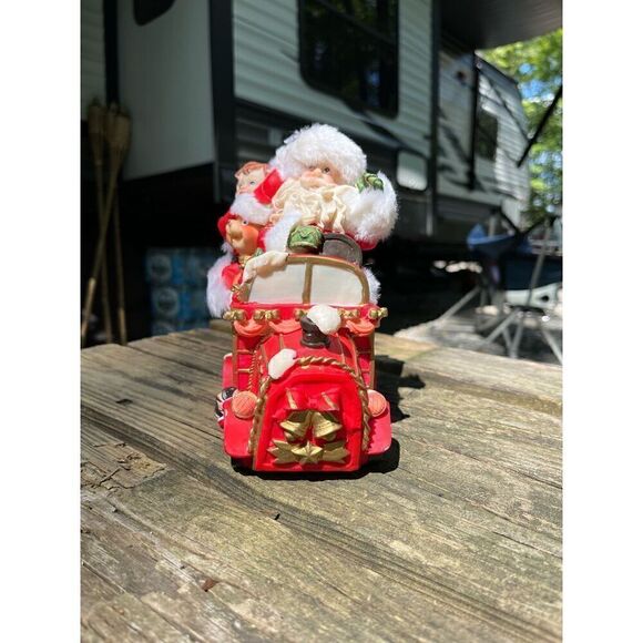 Santa Claus his helpers toys in a car￼ - Picture 16 of 16